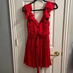 Red ruffled tie back mini dress